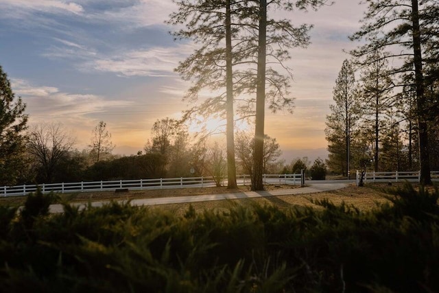 view of community with fence