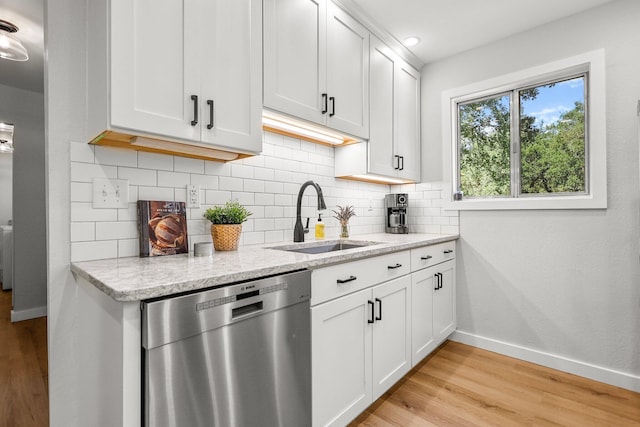 20190 Lupine Dr, Redding, CA 96002 - kitchen featuring dishwasher, a sink, baseboards, tasteful backsplash, and light wood-style flooring
