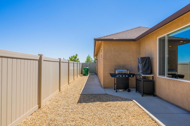 4461 Risstay Way, Shasta Lake, CA 96019 - exterior space featuring area for grilling and a fenced backyard