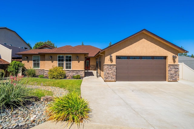 4461 Risstay Way, Shasta Lake, CA 96019 - ranch-style home with stone siding, stucco siding, driveway, and a garage