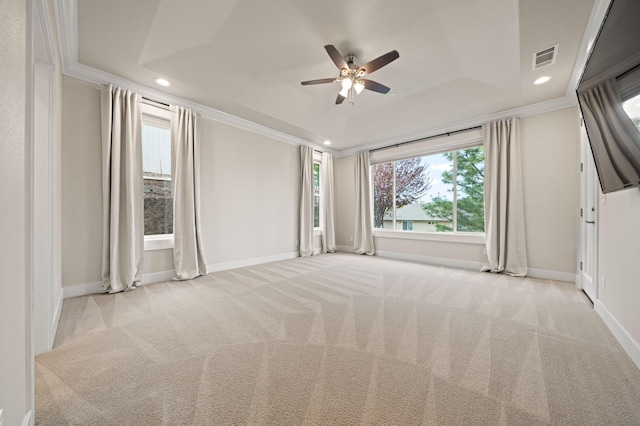 4461 Risstay Way, Shasta Lake, CA 96019 - carpeted empty room featuring visible vents, a ceiling fan, a tray ceiling, crown molding, and baseboards
