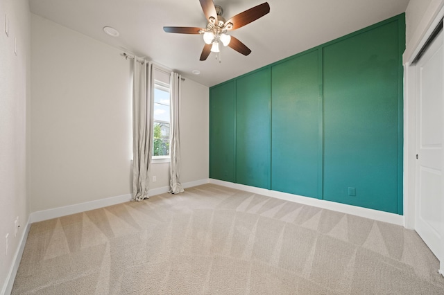4461 Risstay Way, Shasta Lake, CA 96019 - carpeted empty room featuring a decorative wall, baseboards, and a ceiling fan