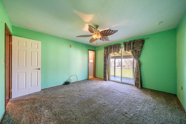1200 Lema Rd, Redding, CA 96003 - carpeted empty room with a textured ceiling and ceiling fan