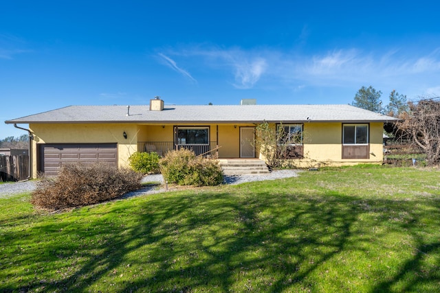 1200 Lema Rd, Redding, CA 96003 - ranch-style home with a front lawn, an attached garage, and stucco siding