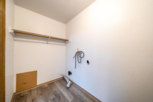 1200 Lema Rd, Redding, CA 96003 - clothes washing area featuring laundry area, hookup for a washing machine, and wood finished floors
