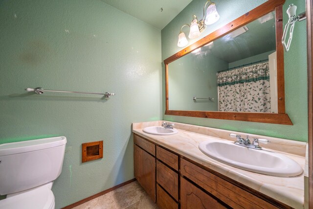 1200 Lema Rd, Redding, CA 96003 - full bath featuring a sink, baseboards, toilet, and double vanity