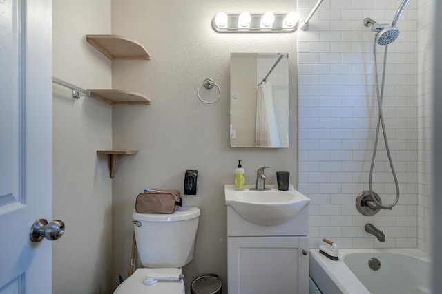 bathroom with toilet, vanity, and shower / bath combination with curtain