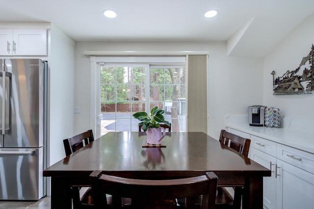 dining area featuring recessed lighting