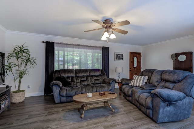 living area featuring a ceiling fan, crown molding, and wood finished floors
