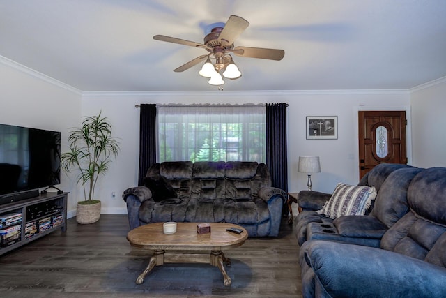 living area featuring crown molding, wood finished floors, and a ceiling fan