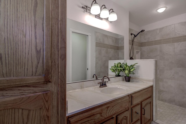 bathroom with vanity and walk in shower