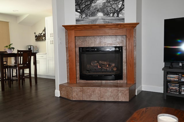 37105 Sapphire Rd, Burney, CA 96013 - detailed view of wood finished floors, a fireplace, and baseboards