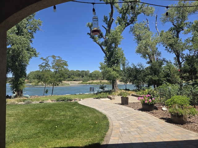 21672 Arden Way, Anderson, CA 96007 - view of home's community with a water view and a yard