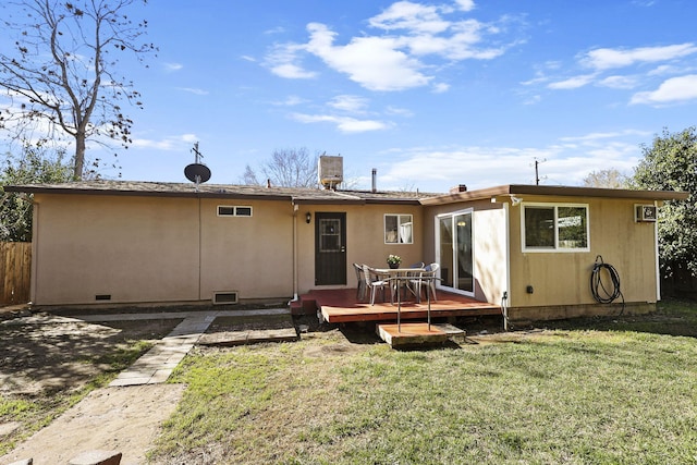 3235 Sharon Ave, Anderson, CA 96007 - back of house with fence, crawl space, a deck, and a lawn