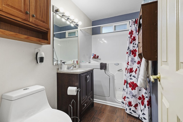 3235 Sharon Ave, Anderson, CA 96007 - bathroom featuring wood finished floors, toilet, a shower with shower curtain, and vanity