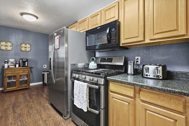 3235 Sharon Ave, Anderson, CA 96007 - kitchen with a textured ceiling, stainless steel range with gas cooktop, black microwave, dark wood-style floors, and light brown cabinetry