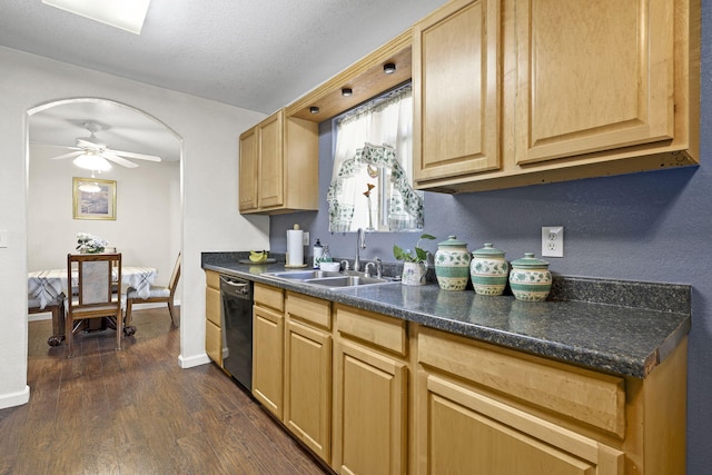 3235 Sharon Ave, Anderson, CA 96007 - kitchen with dark wood-type flooring, a sink, dark countertops, arched walkways, and dishwasher