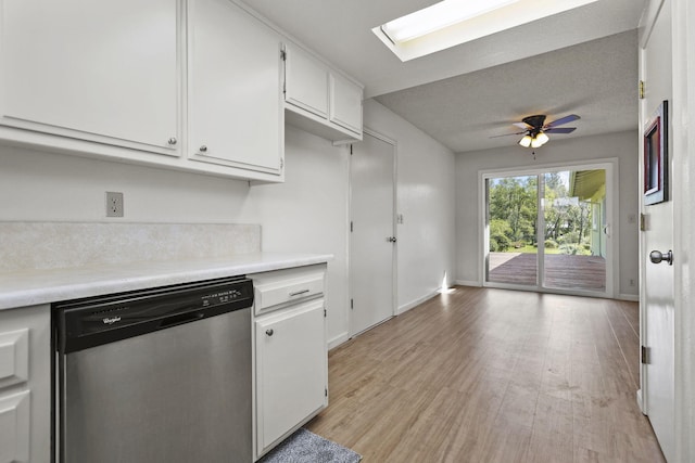 kitchen with white cabinetry, light countertops, stainless steel dishwasher, ceiling fan, and light wood-style flooring