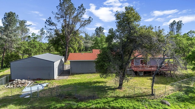 17622 China Gulch Dr, Anderson, CA 96007 - view of yard with a fenced backyard, a wooden deck, and an outdoor structure