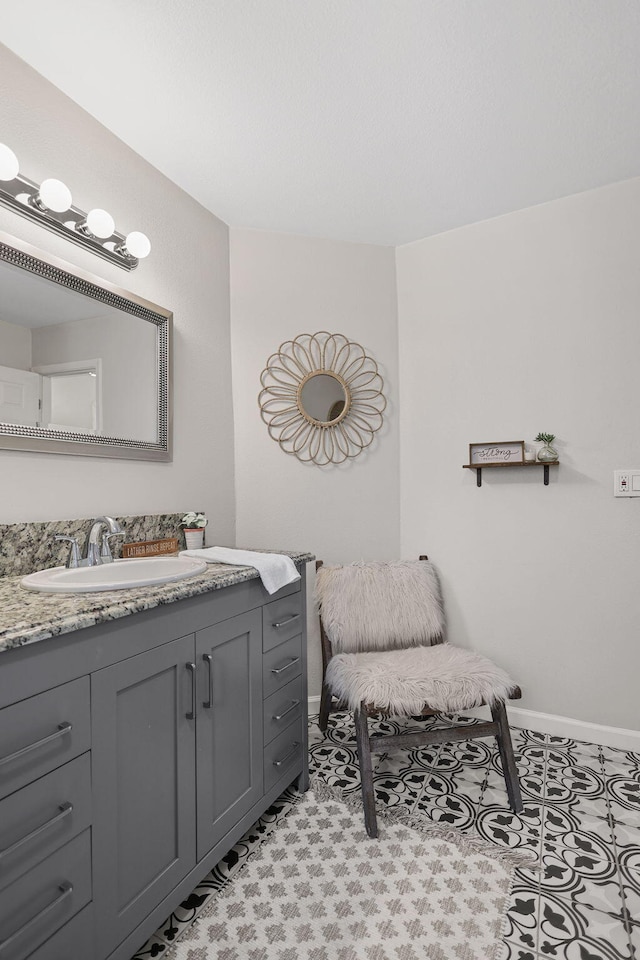17622 China Gulch Dr, Anderson, CA 96007 - bathroom featuring baseboards and vanity