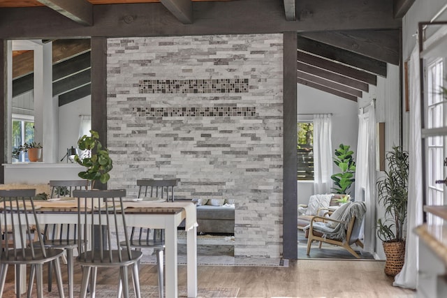 17622 China Gulch Dr, Anderson, CA 96007 - dining space with lofted ceiling with beams and wood finished floors