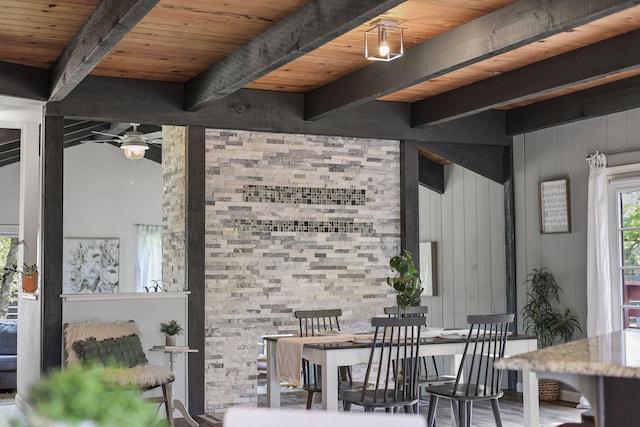 17622 China Gulch Dr, Anderson, CA 96007 - dining area featuring wooden ceiling, beam ceiling, and ceiling fan
