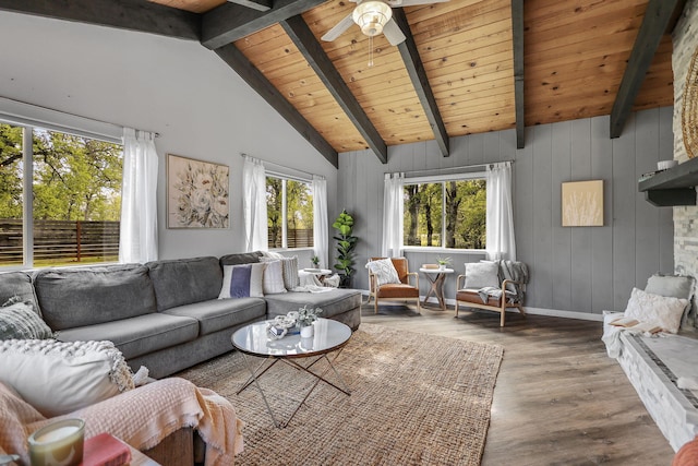 17622 China Gulch Dr, Anderson, CA 96007 - living room featuring high vaulted ceiling, baseboards, beamed ceiling, a ceiling fan, and wood finished floors
