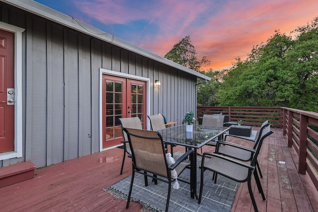 17622 China Gulch Dr, Anderson, CA 96007 - deck at dusk featuring french doors and outdoor dining area
