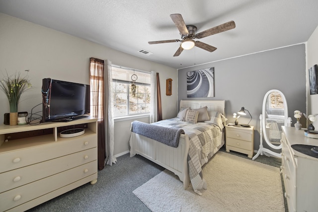20371 Geo Ln, Lakehead, CA 96051 - bedroom with visible vents, ceiling fan, carpet, and a textured ceiling