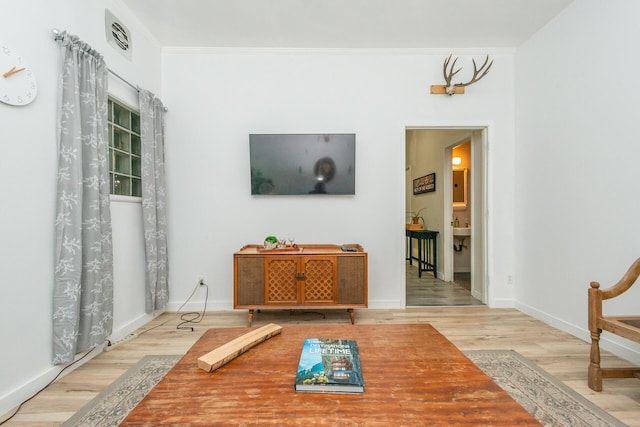 493 Main St, Weaverville, CA 96093 - living room featuring wood finished floors and crown molding