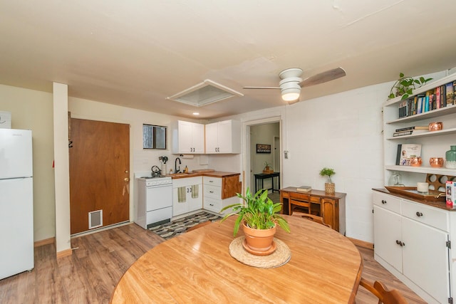 493 Main St, Weaverville, CA 96093 - dining room featuring attic access, light wood-style floors, and a ceiling fan