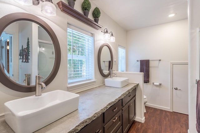 full bath featuring vanity, recessed lighting, toilet, baseboards, and wood finished floors