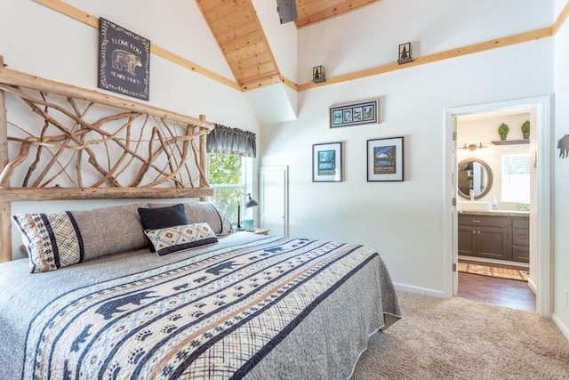 bedroom featuring beam ceiling, carpet floors, high vaulted ceiling, and baseboards