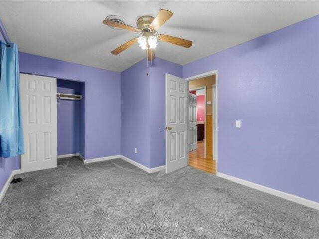 926 Cortina Dr, Orland, CA 95963 - unfurnished bedroom featuring carpet flooring, a closet, and baseboards