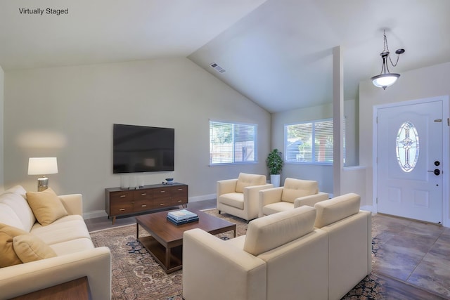 1680 Morningsun Dr, Redding, CA 96002 - living area with vaulted ceiling and baseboards
