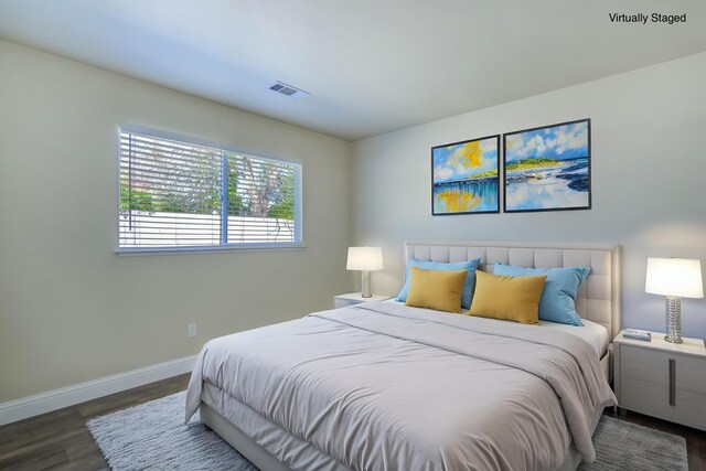 1680 Morningsun Dr, Redding, CA 96002 - bedroom featuring baseboards and wood finished floors