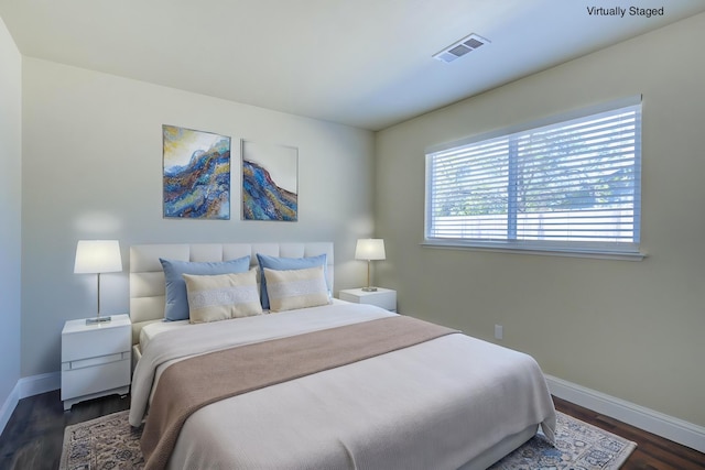 1680 Morningsun Dr, Redding, CA 96002 - bedroom with baseboards and dark wood-style floors