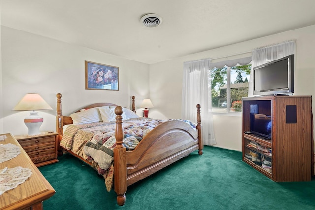 carpeted bedroom with visible vents