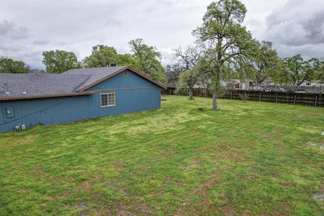 view of yard featuring fence