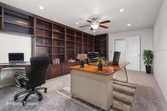 office featuring light carpet, recessed lighting, ceiling fan, and baseboards