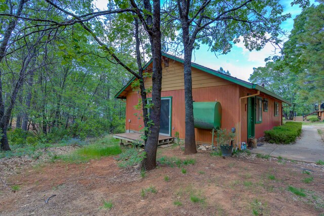 view of property exterior featuring heating fuel