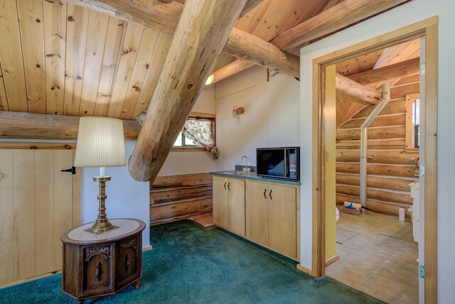 additional living space featuring stairs, wood ceiling, beamed ceiling, and log walls