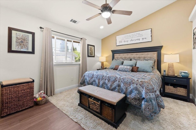 2919 Buckingham Dr, Shasta Lake, CA 96019 - bedroom with ceiling fan, vaulted ceiling, visible vents, wood finished floors, and baseboards