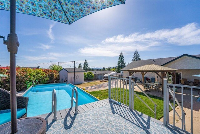 2919 Buckingham Dr, Shasta Lake, CA 96019 - pool with a shed, a gazebo, a yard, and an outdoor structure