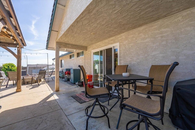 2919 Buckingham Dr, Shasta Lake, CA 96019 - view of patio / terrace with fence, outdoor dining area, and area for grilling