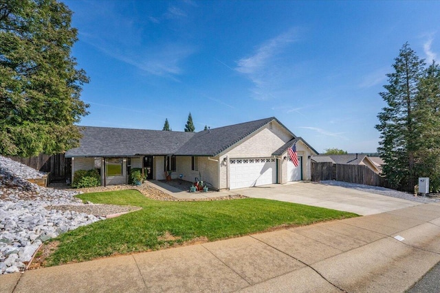 2919 Buckingham Dr, Shasta Lake, CA 96019 - ranch-style home with driveway, a garage, fence, and a front lawn