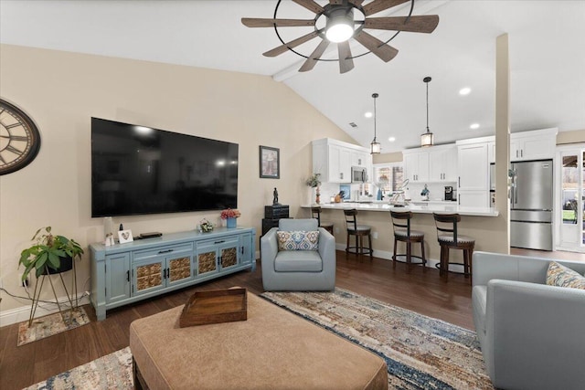 2919 Buckingham Dr, Shasta Lake, CA 96019 - living area featuring dark wood-style flooring, ceiling fan, recessed lighting, and vaulted ceiling