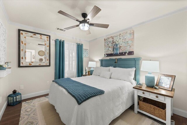 2919 Buckingham Dr, Shasta Lake, CA 96019 - bedroom featuring crown molding, visible vents, baseboards, and wood finished floors