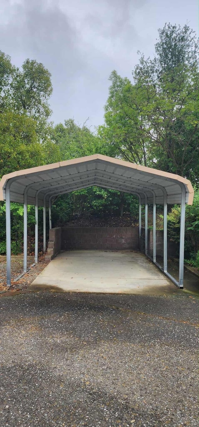 view of parking with a detached carport