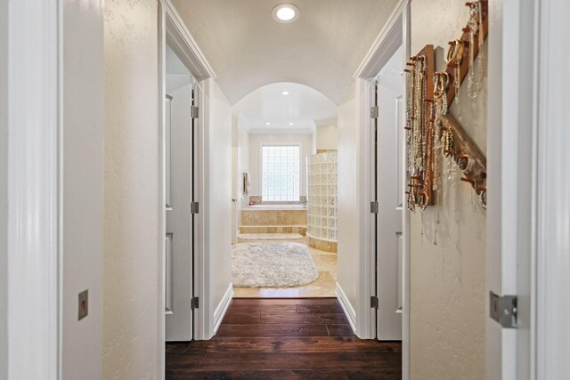 13194 Tierra Heights Rd, Redding, CA 96003 - corridor featuring arched walkways, wood-type flooring, and recessed lighting
